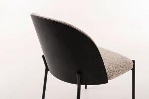 Ingrid chair, curved black veneer seat and mottled white upholstery