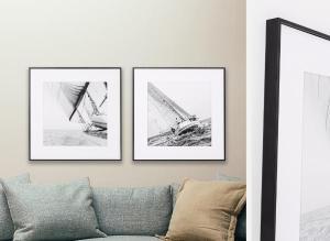 Set of 2 pictures with wooden frames 50*50 cm/unit.